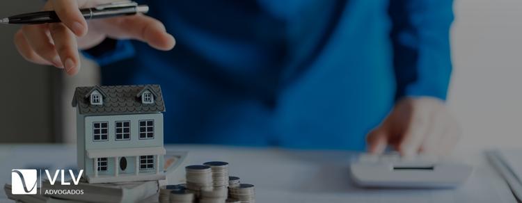 Imóvel com dívida de condomínio e IPTU